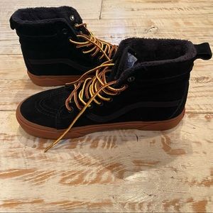 Vans black suede high top sneakers